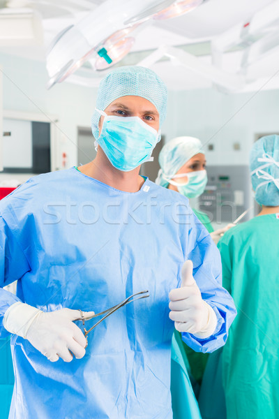 Stock photo: Hospital surgeons operating in operation room