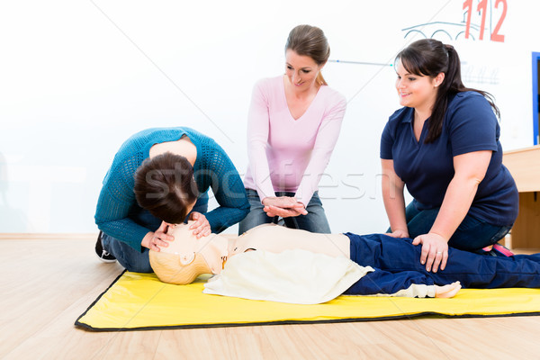 Group of women in first aid course Stock photo © Kzenon