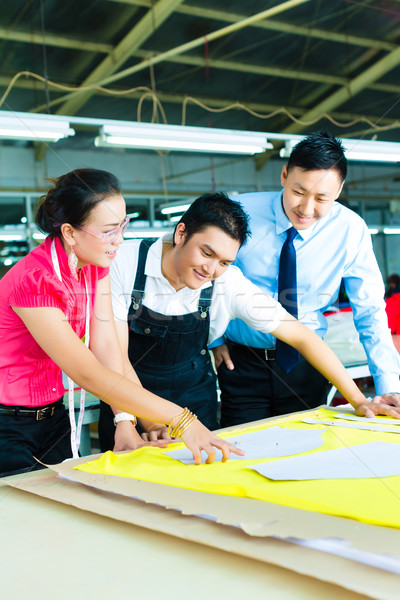 Worker, Dressmaker and CEO in a factory Stock photo © Kzenon