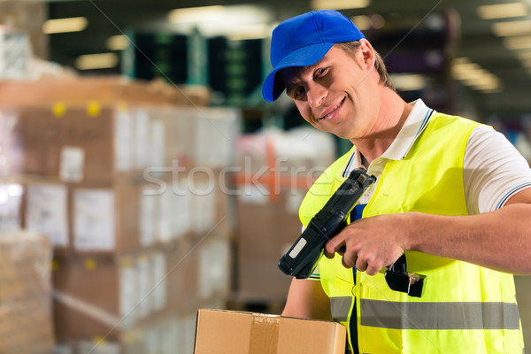 worker scans package in warehouse of forwarding Stock photo © Kzenon