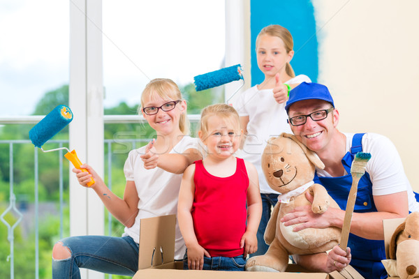 Family moving home and renovating house Stock photo © Kzenon