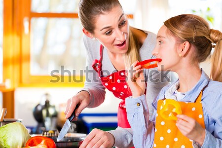 People in American diner or restaurant eating fast food Stock photo © Kzenon