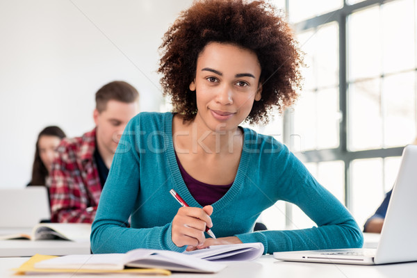 Portrait of an African American millennial student smiling with  Stock photo © Kzenon