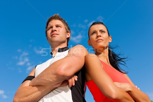 Young couple is doing sports outdoors Stock photo © Kzenon