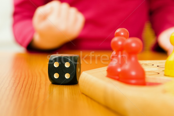 Family playing boardgame Stock photo © Kzenon
