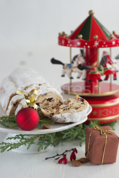 Christmas cake - Stollen, bauble and carousel music box Stock photo © laciatek