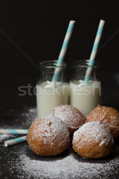 Jelly doughnuts and two bottles of milk Stock photo © laciatek