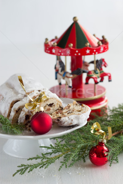 Christmas cake - stollen, bauble and carousel music box Stock photo © laciatek