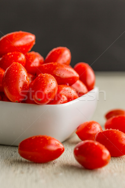 Puchar pomidorki grupy biały owoców zielone Zdjęcia stock © LAMeeks