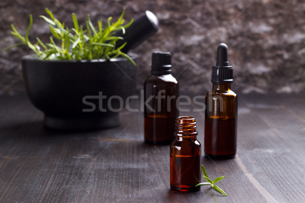 Romero aceites esenciales aromaterapia oscuro madera Foto stock © Lana_M