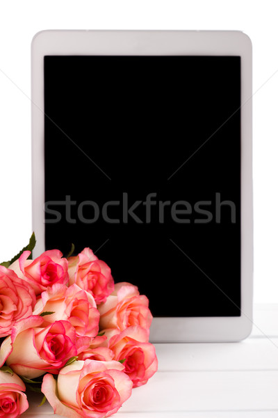 Tablet roze rozen boeket witte ruimte Stockfoto © Lana_M