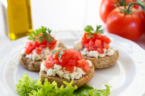 Bruschetta with tomato and feta cheese Stock photo © Lana_M
