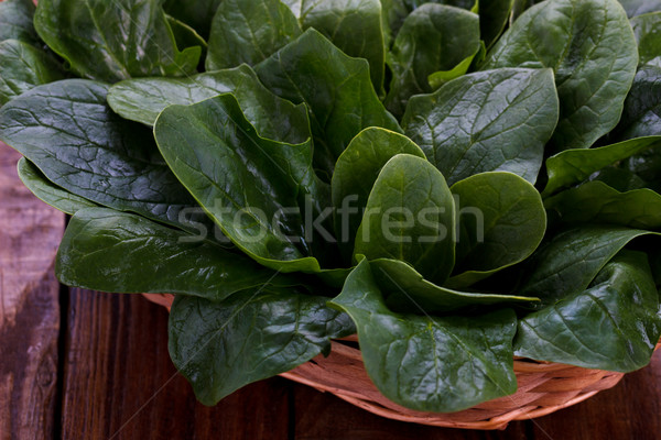 Spinazie bladeren mand rustiek houten Stockfoto © Lana_M