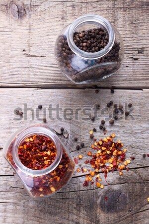 Chili flakes and black pepper Stock photo © Lana_M