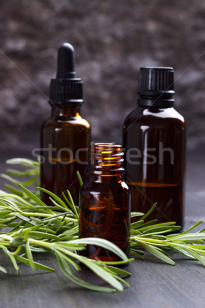 Romarin huiles essentielles aromathérapie sombre bois herbe Photo stock © Lana_M