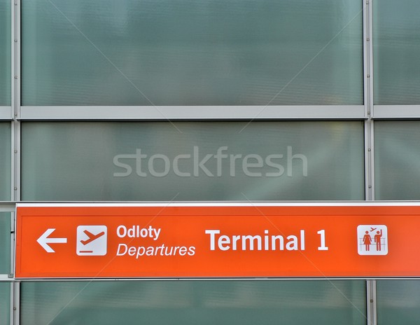 Indulás felirat narancs repülőjáratok nyíl repülőgép Stock fotó © ldambies