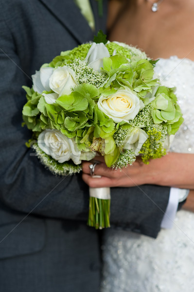 bride and groom with wedding bouquet Stock photo © leeavison