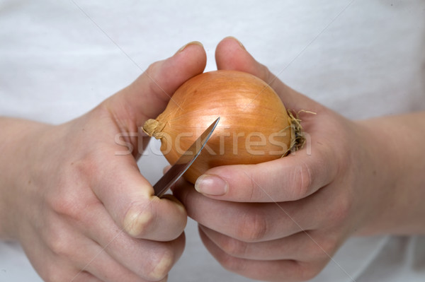peeling an onion Stock photo © leeavison