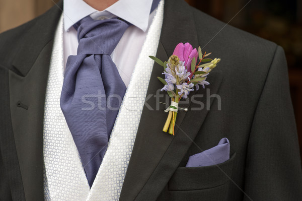 groom with purple flower buttonhole Stock photo © leeavison