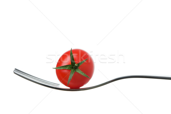 Stock photo: cherry tomato on a fork against white