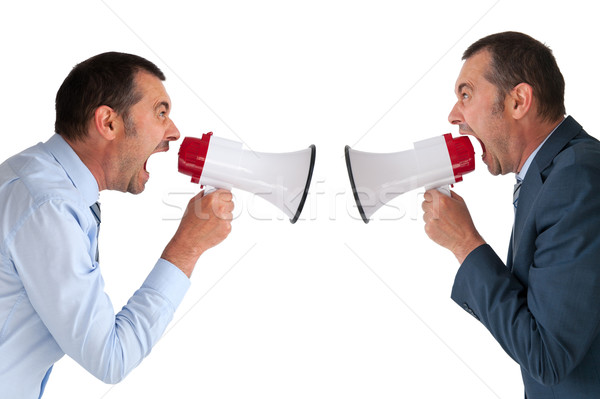 businessman yelling at himself Stock photo © leeavison