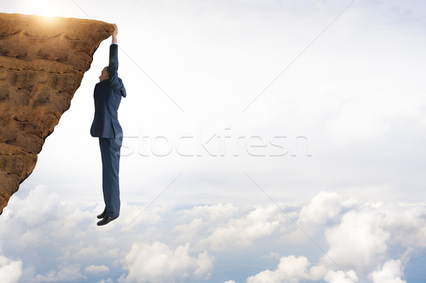 Meydan okumak iş işadamı adam tırmanma tehlike Stok fotoğraf © leeavison