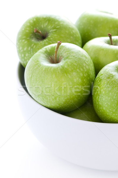 Verde bunicuta mere proaspăt alb castron Imagine de stoc © leeavison