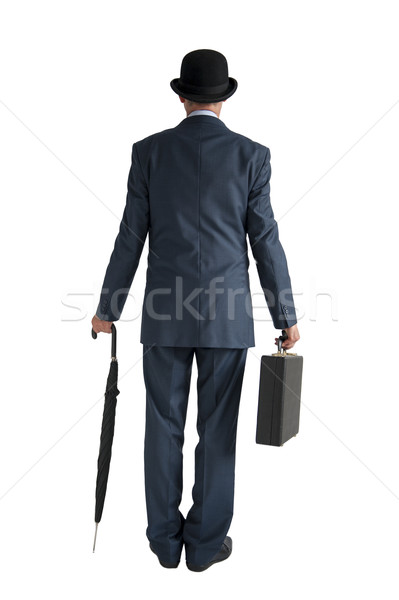 english businessman with bowler hat and umbrella isolated white  Stock photo © leeavison