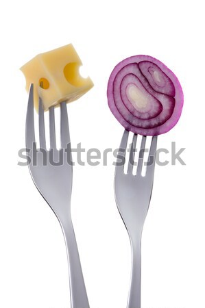 red onion rings on a fork against white background Stock photo © leeavison