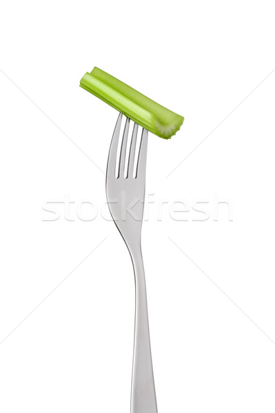celery stalk on fork against white Stock photo © leeavison