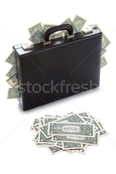 briefcase stuffed with dollar bills Stock photo © leeavison