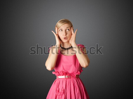 Szexi női utaskíserő rózsaszín néz kamera Stock fotó © leedsn