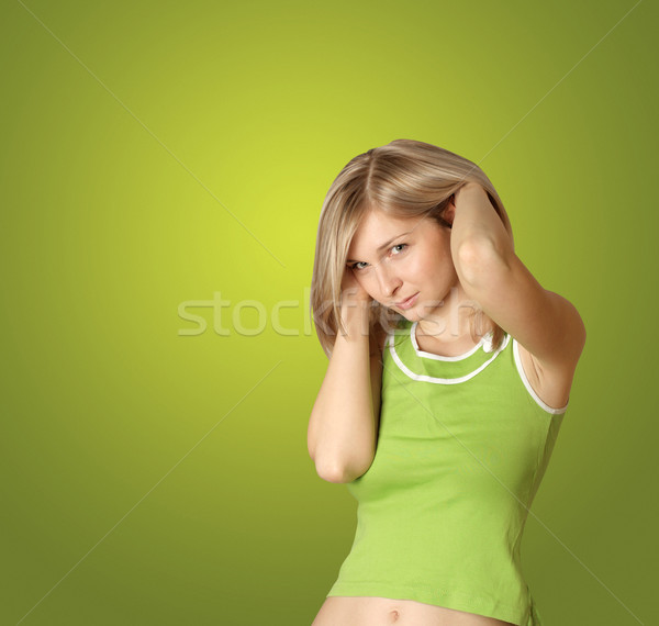 cute girl with hands in her hair Stock photo © leedsn