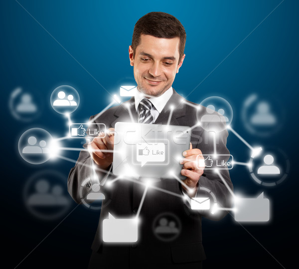 Stock photo: Businessman With I Pad in Social Network