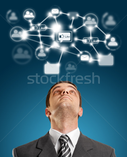 Empresario mirando red social ordenador mano portátil Foto stock © leedsn