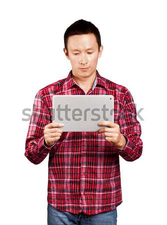 Asian Man With Touch Pad Stock photo © leedsn