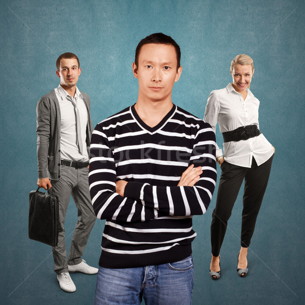 Teamwork and Asian Man In Striped Pullover Stock photo © leedsn