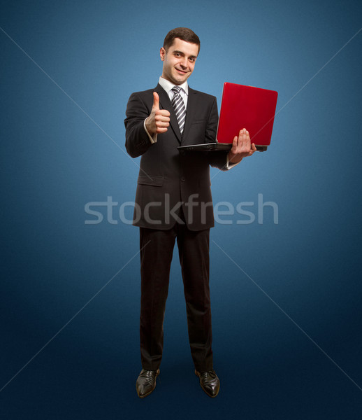 businessman with laptop shows well done Stock photo © leedsn