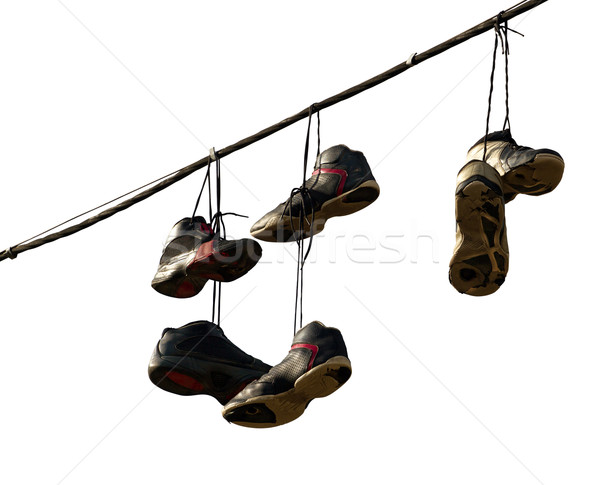 Sneakers Hanging on a Telephone Line Stock photo © leedsn