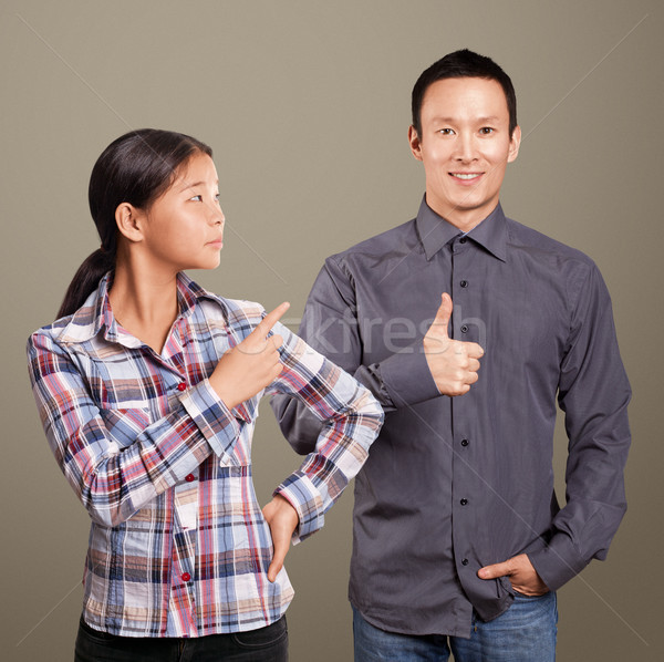 Asian Man and Girl Showing Well Done Stock photo © leedsn