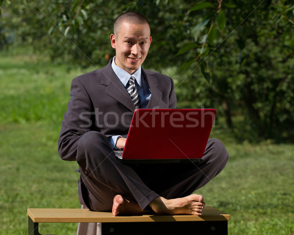 Mannelijke lotus pose buitenshuis werken internet Stockfoto © leedsn