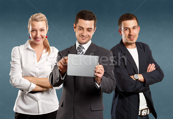 Business Team With Touch Pad Stock photo © leedsn