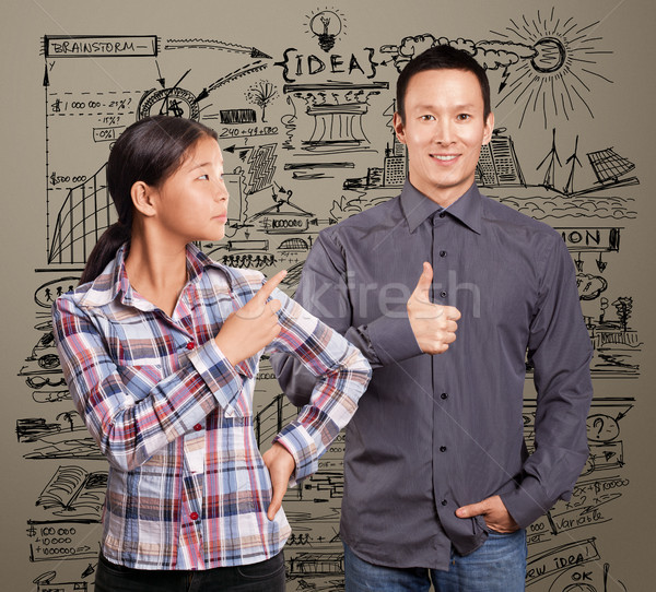 Asian Man and Girl Showing Well Done Stock photo © leedsn