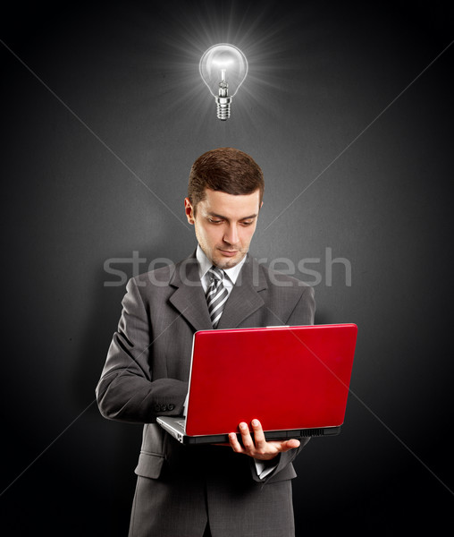Stockfoto: Zakenman · laptop · idee · Rood · handen · lamp