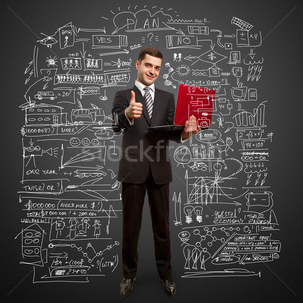 businessman with laptop shows well done Stock photo © leedsn