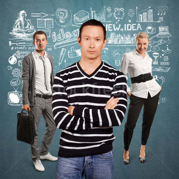 Teamwork and Asian Man In Striped Pullover Stock photo © leedsn