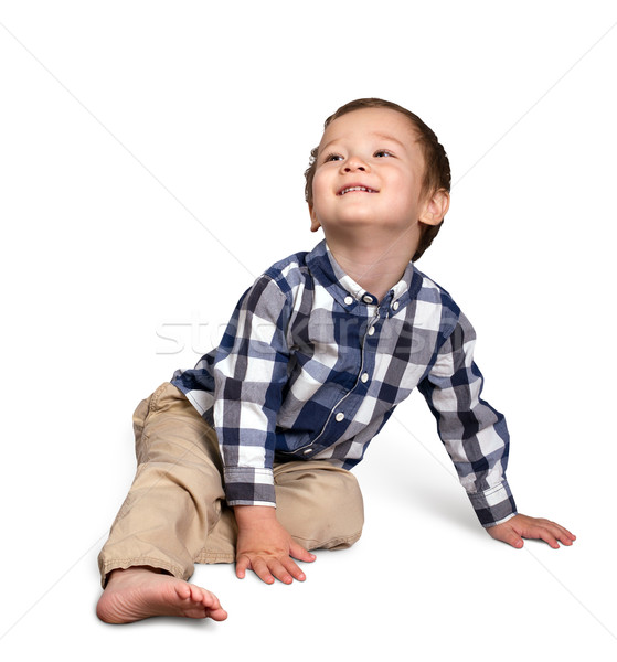 Cute boy siting on the floor Stock photo © leedsn