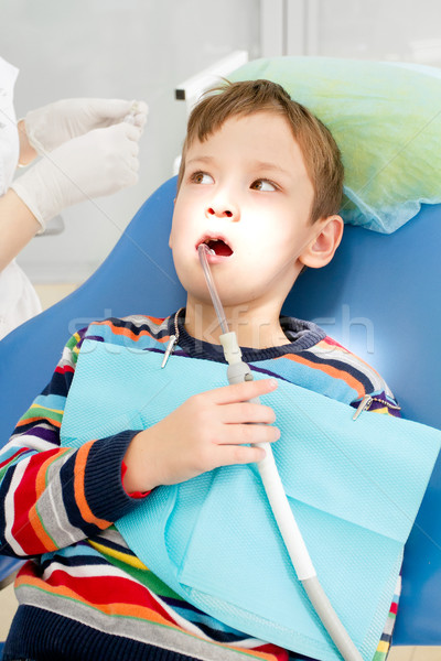 Boy and dentist during a dental procedure Stock photo © leedsn