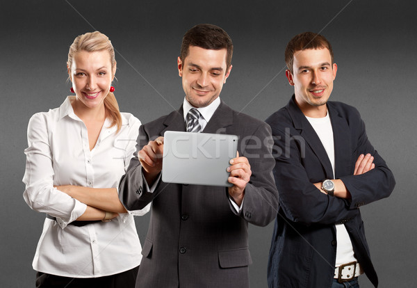 Business Team With Touch Pad Stock photo © leedsn