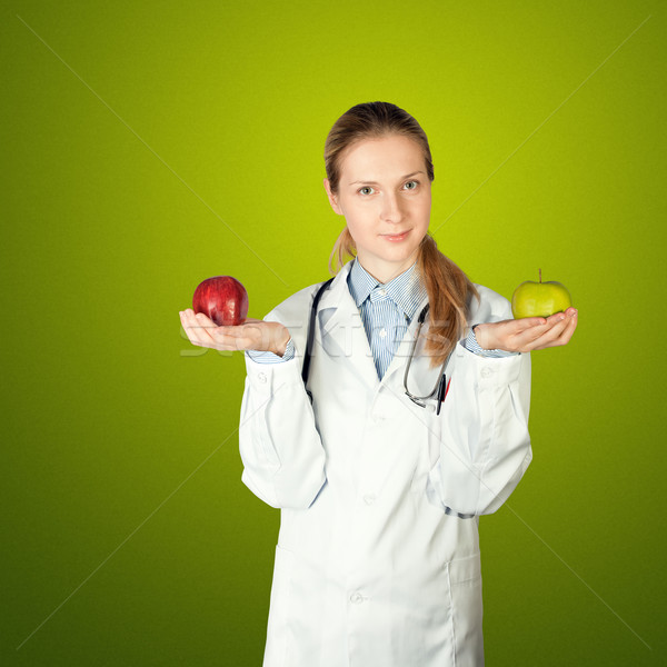 Foto stock: Femenino · médico · dos · manzanas · verde · rojo